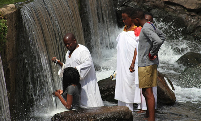Fig 2.1 Baptism in a waterfalls or gauge.jpg (244 KB)
